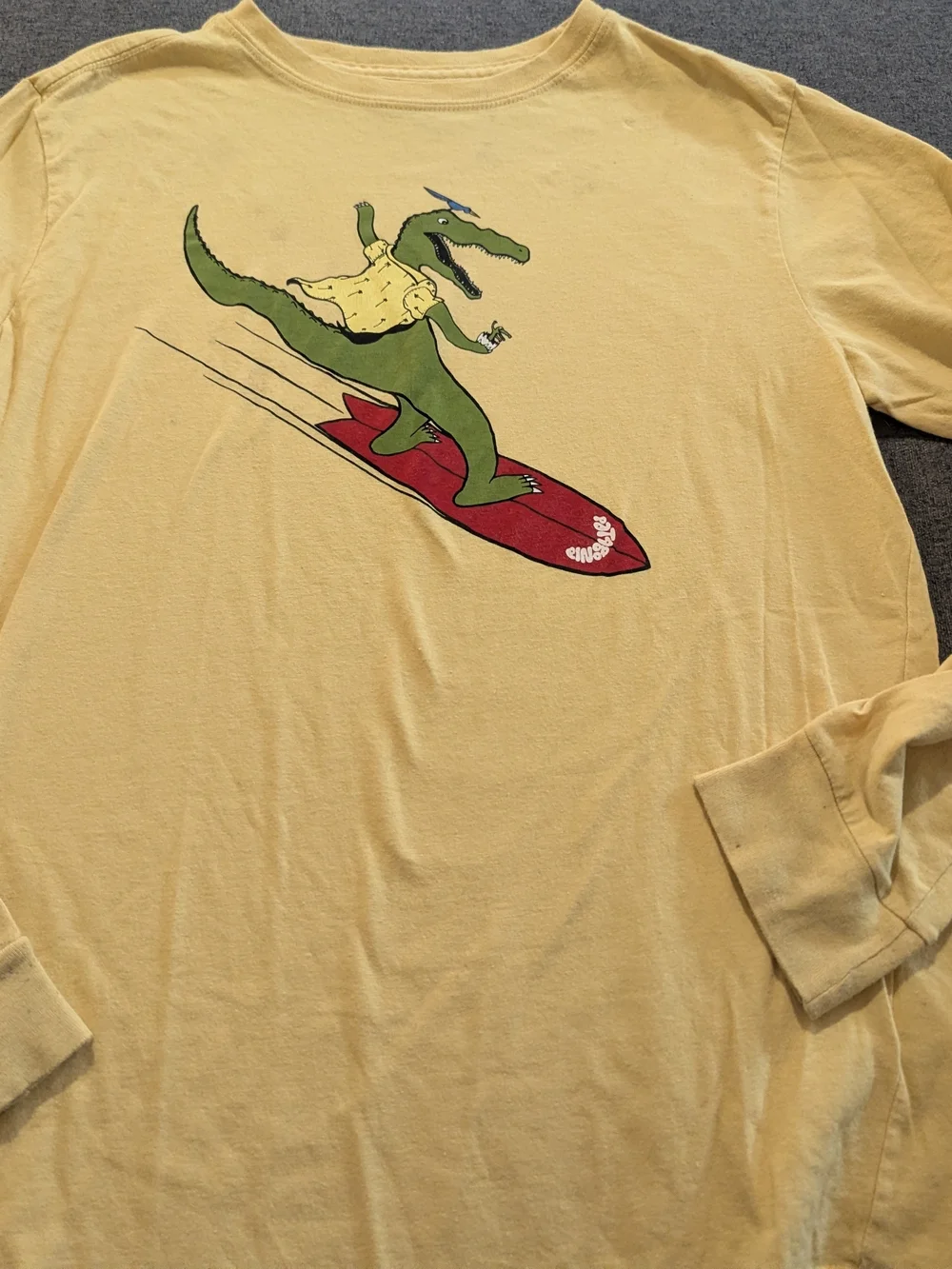 Patagonia Yellow Long Sleeve Tee with Surfing Alligator Graphic